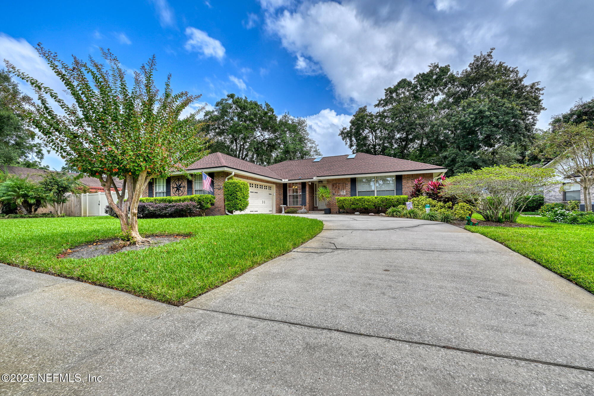10905 Brentfield Road Jacksonville, FL 32225 - Photo 3 of 36 a front view of house with yard and green space