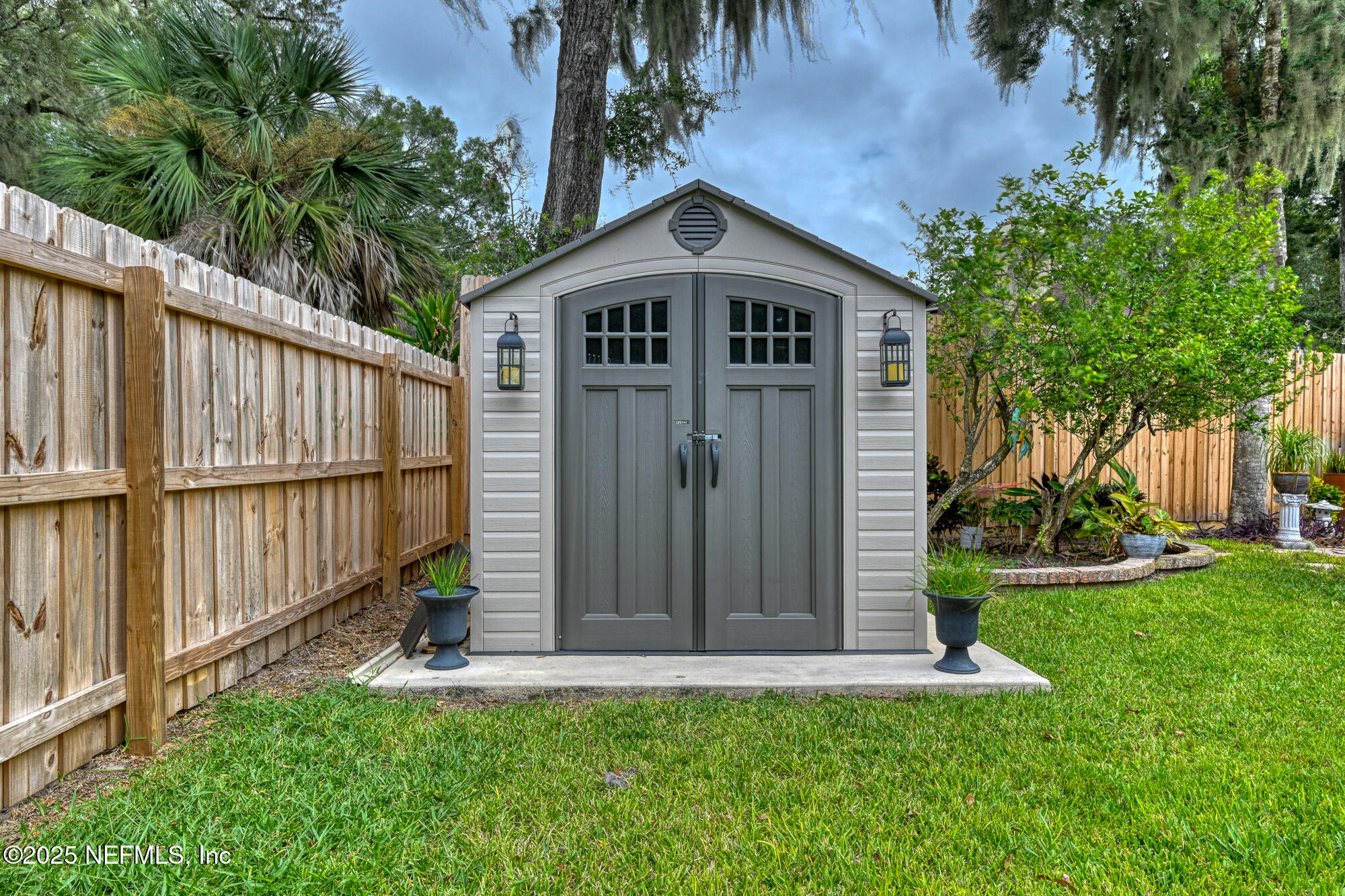 10905 Brentfield Road Jacksonville, FL 32225 - Photo 32 of 36 a front view of a house with garden