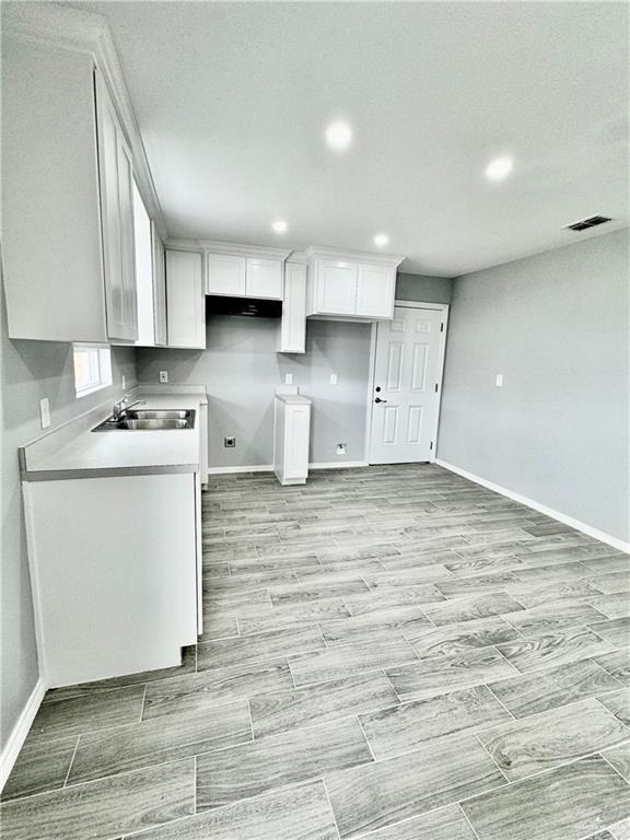 436 East Acacia Avenue, Unit 1 Alamo, TX 78516 - Photo 3 of 11 a view of kitchen with wooden floor