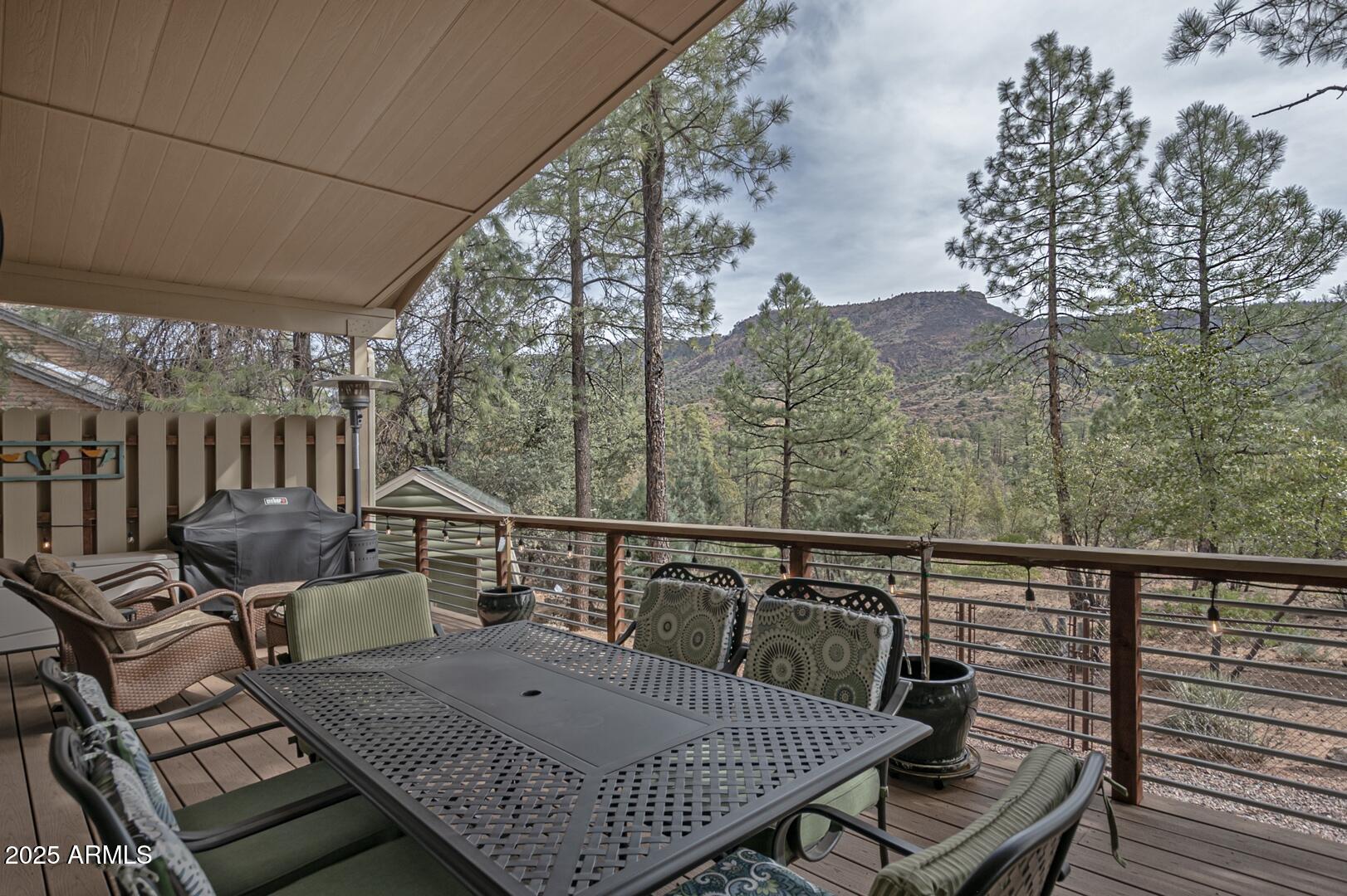3465 Whispering Pines Road Pine, AZ 85544 - Photo 24 of 53 a view of a balcony with furniture