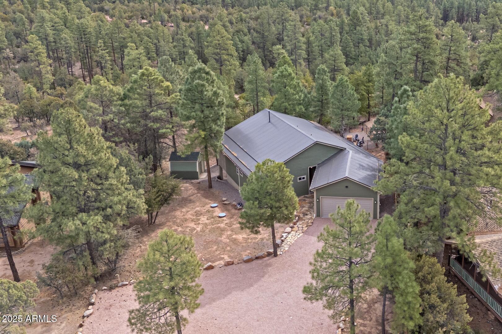 3465 Whispering Pines Road Pine, AZ 85544 - Photo 44 of 53 front view of a house with a yard