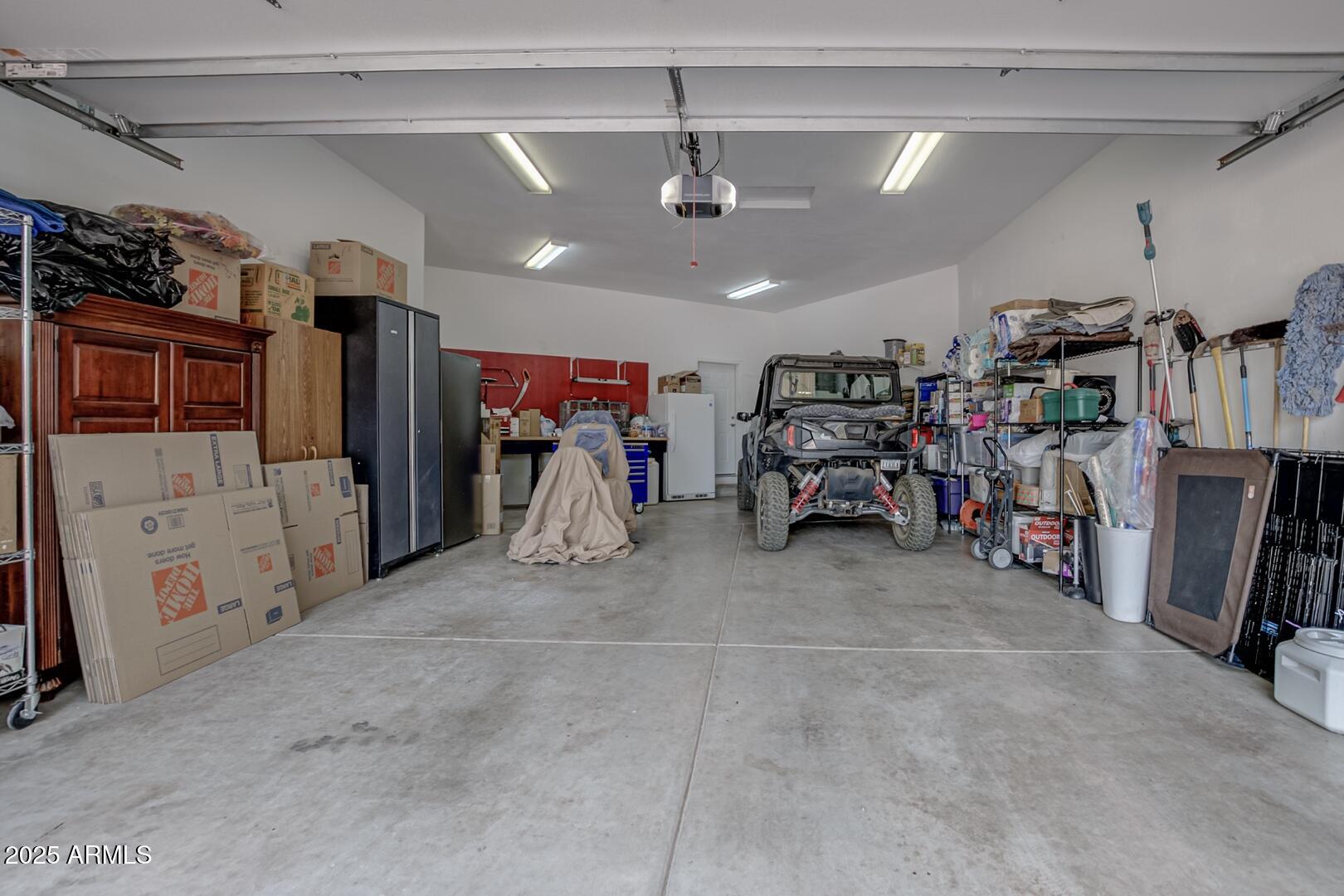 3465 Whispering Pines Road Pine, AZ 85544 - Photo 52 of 53 a view of a garage with storage