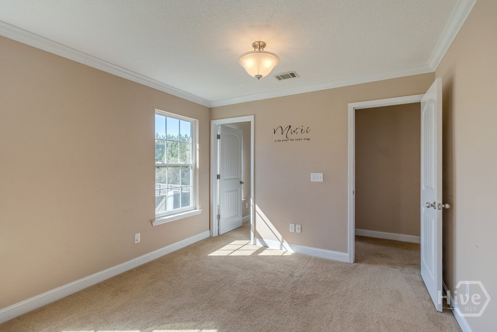 46 Outpost Trail Midway, GA 31320 - Photo 20 of 37 Primary Bedroom