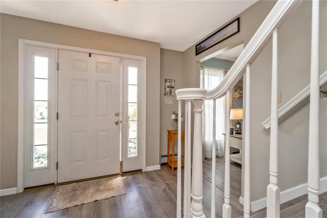 9461 Red Road Kempton, PA 19529 - Photo 4 of 55 A welcoming entry features a paneled front door flanked by sidelights and a graceful staircase.