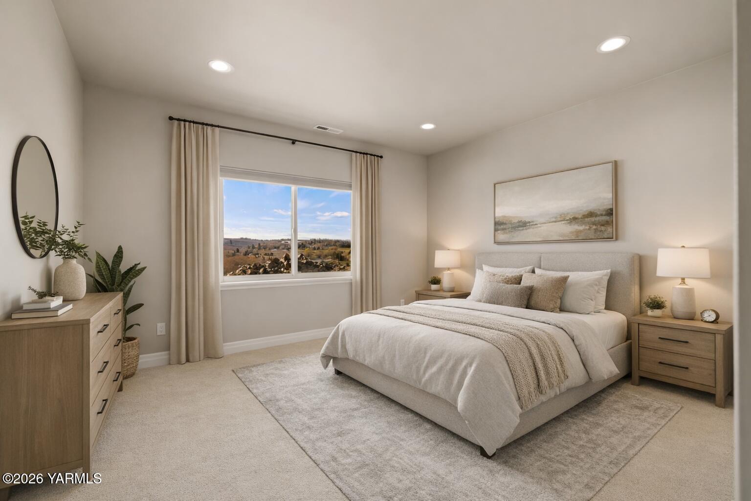 455 Rankin Road Selah, WA 98942 - Photo 28 of 57 a bedroom with a large bed and a window