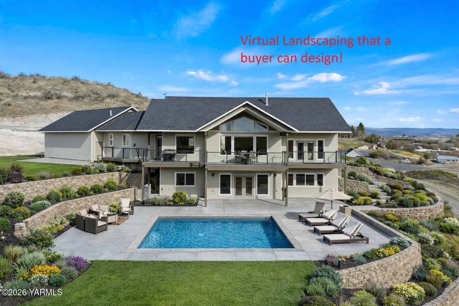 455 Rankin Road Selah, WA 98942 - Photo 40 of 57 a aerial view of a house with swimming pool and furniture