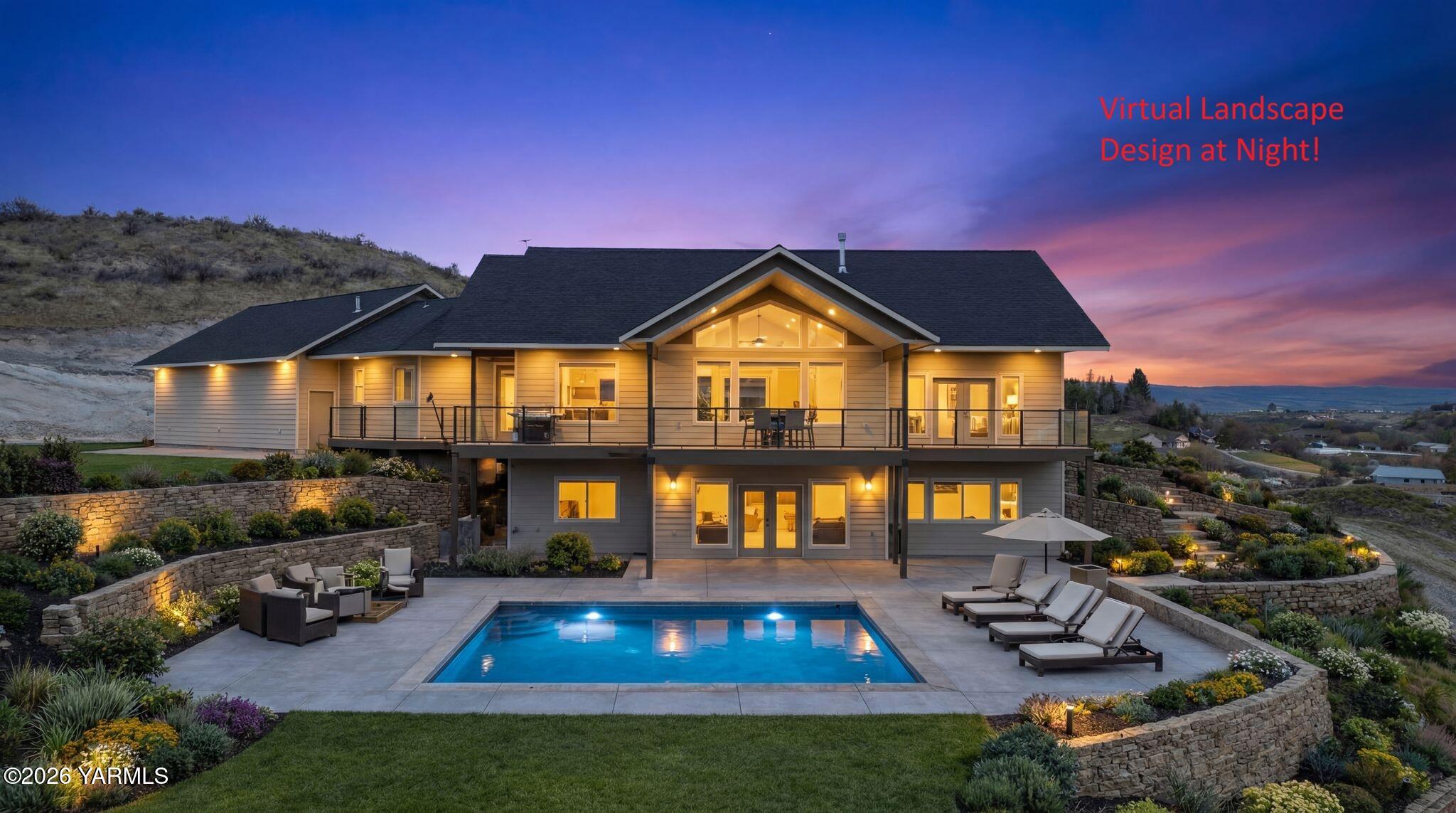 455 Rankin Road Selah, WA 98942 - Photo 42 of 57 a view of a house with swimming pool and sitting area