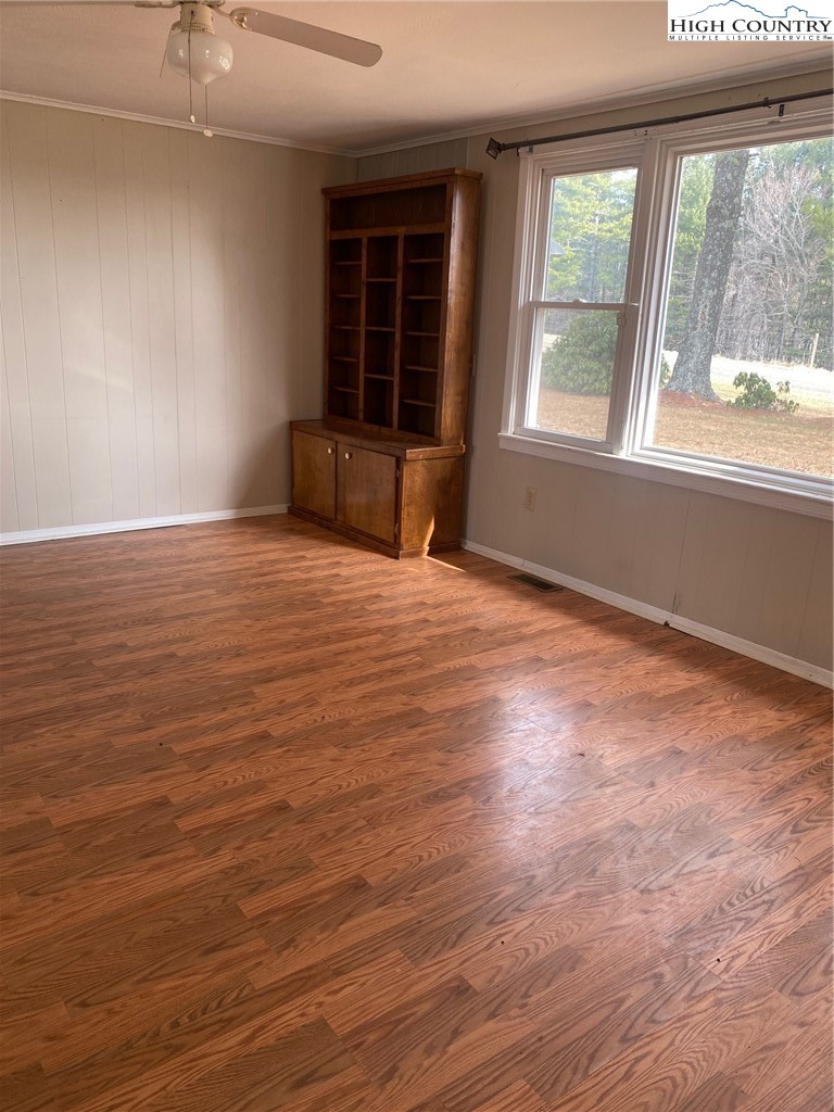 1345 Wagoner Ridge Road Ennice, NC 28623 - Photo 17 of 48 a view of an empty room with a window
