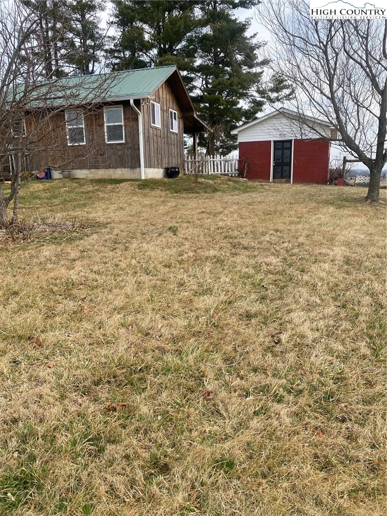 1345 Wagoner Ridge Road Ennice, NC 28623 - Photo 25 of 48 a front view of house with yard