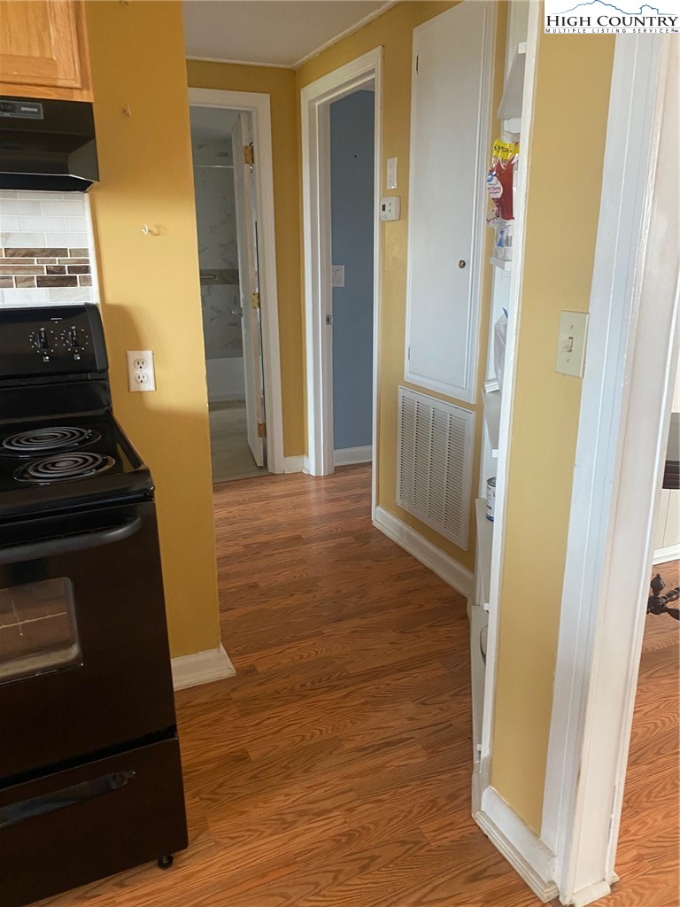 1345 Wagoner Ridge Road Ennice, NC 28623 - Photo 39 of 48 a view of a kitchen from an empty room