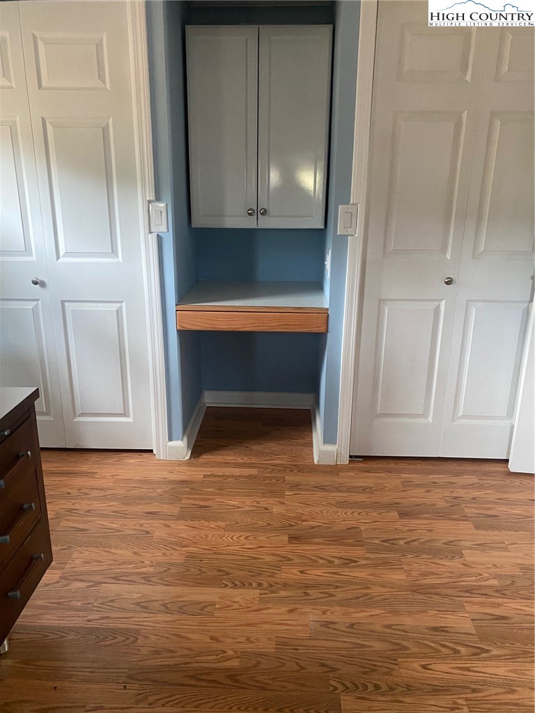 1345 Wagoner Ridge Road Ennice, NC 28623 - Photo 41 of 48 a view of room with wooden floor