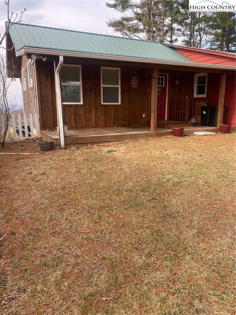 1345 Wagoner Ridge Road Ennice, NC 28623 - Photo 46 of 48 an entrance to house with yard