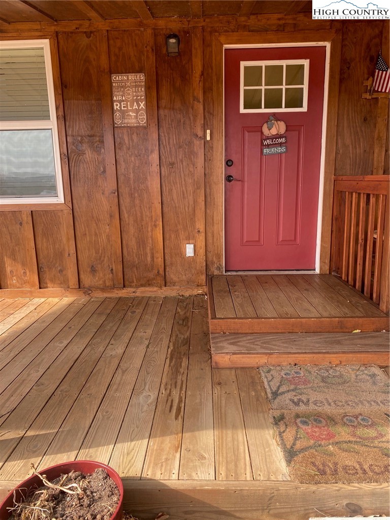 1345 Wagoner Ridge Road Ennice, NC 28623 - Photo 47 of 48 a view of front door of a house