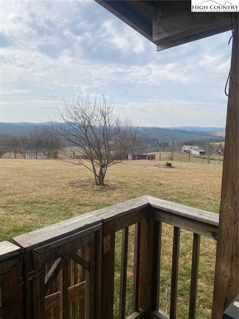 1345 Wagoner Ridge Road Ennice, NC 28623 - Photo 7 of 48 a view of ocean from a balcony