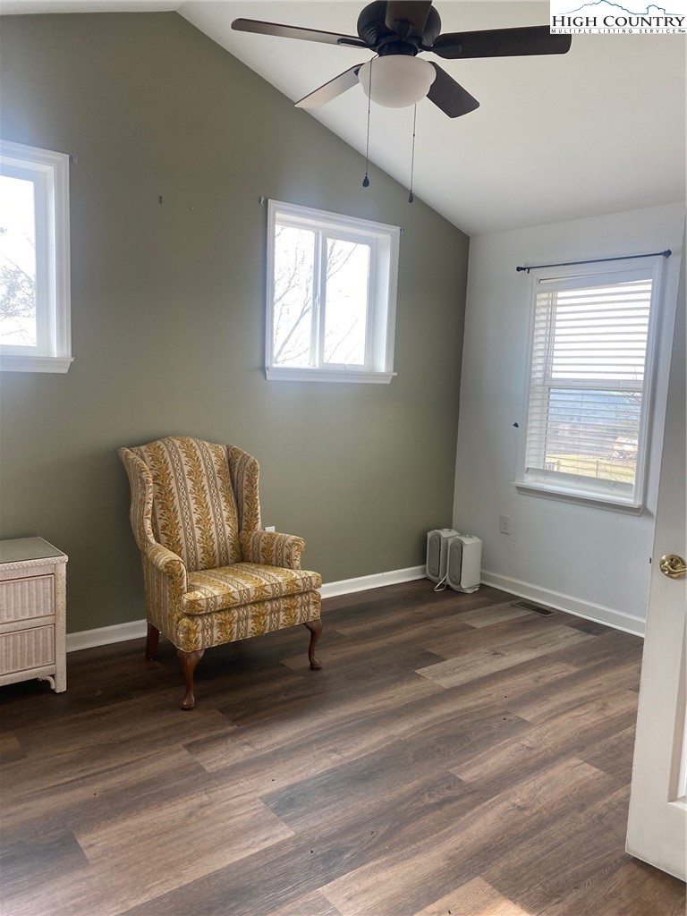 1345 Wagoner Ridge Road Ennice, NC 28623 - Photo 9 of 48 a living room with a couch and a window
