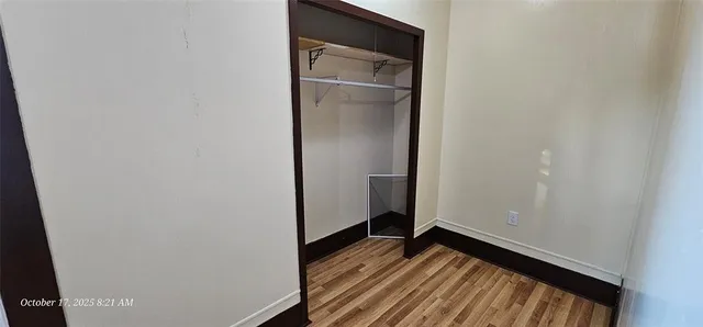 a view of a hallway with washer and dryer