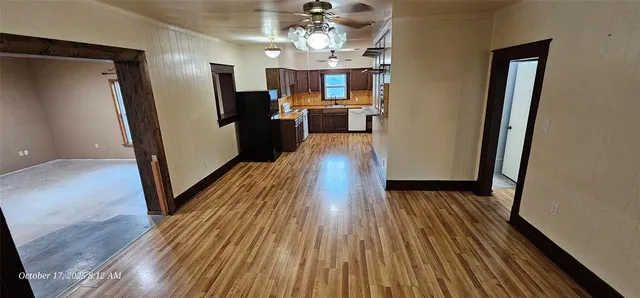 a view of a kitchen from the hallway