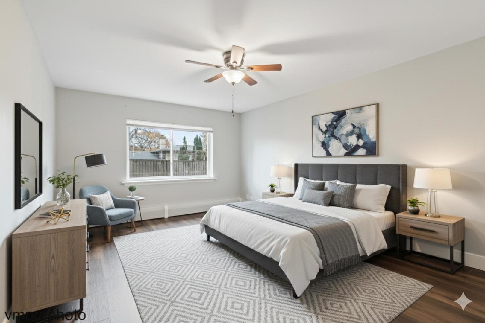 2323 South Goebbert Road, Unit F109 Arlington Heights, IL 60005 - Photo 7 of 11 a bedroom with a large bed and a window