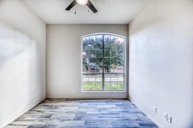 an empty room with windows