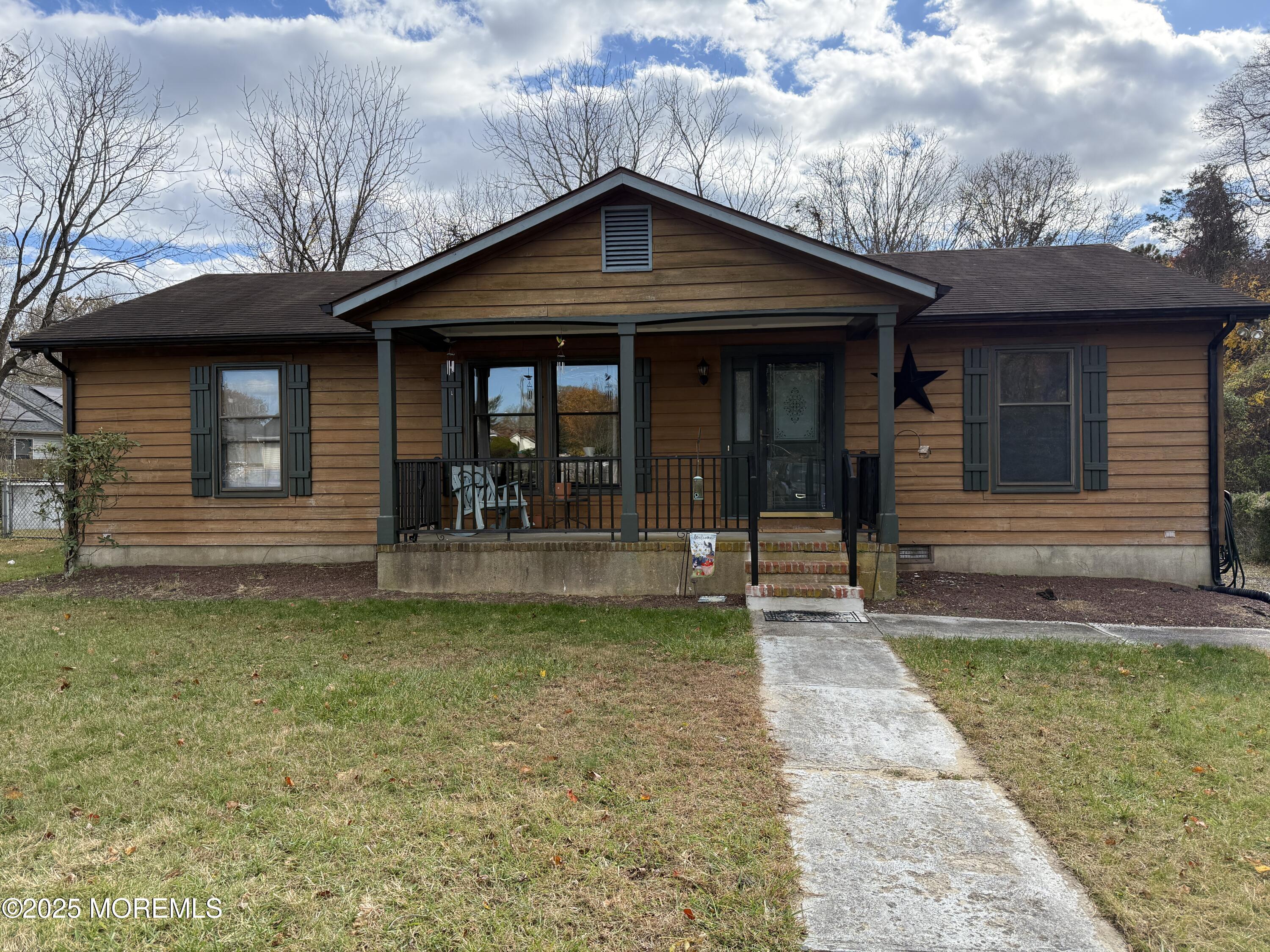 220 B Center Street Tuckerton, NJ 08087 - Photo 1 of 54 a front view of a house with garden