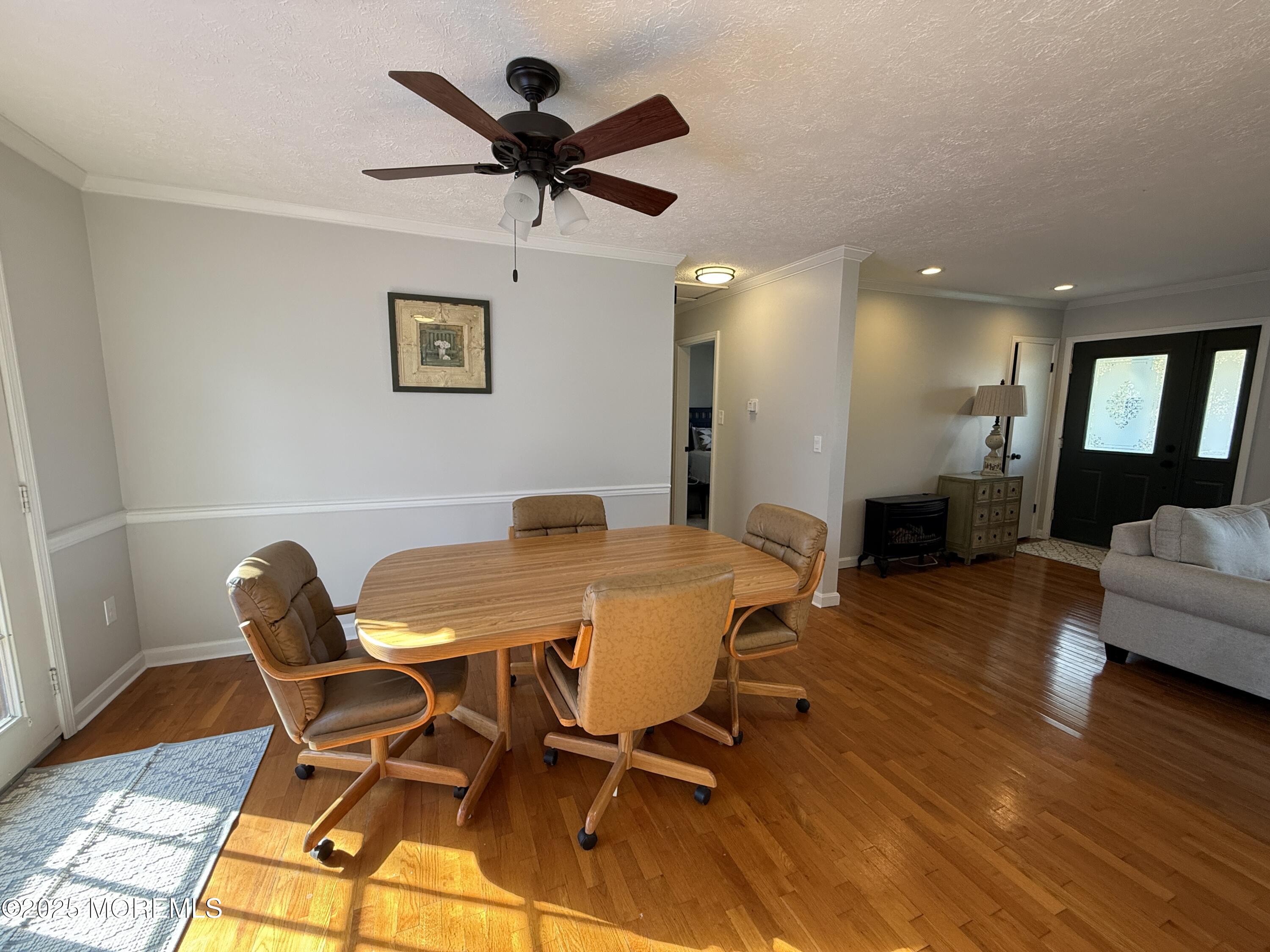 220 B Center Street Tuckerton, NJ 08087 - Photo 12 of 54 a view of a dining room with furniture and wooden floor