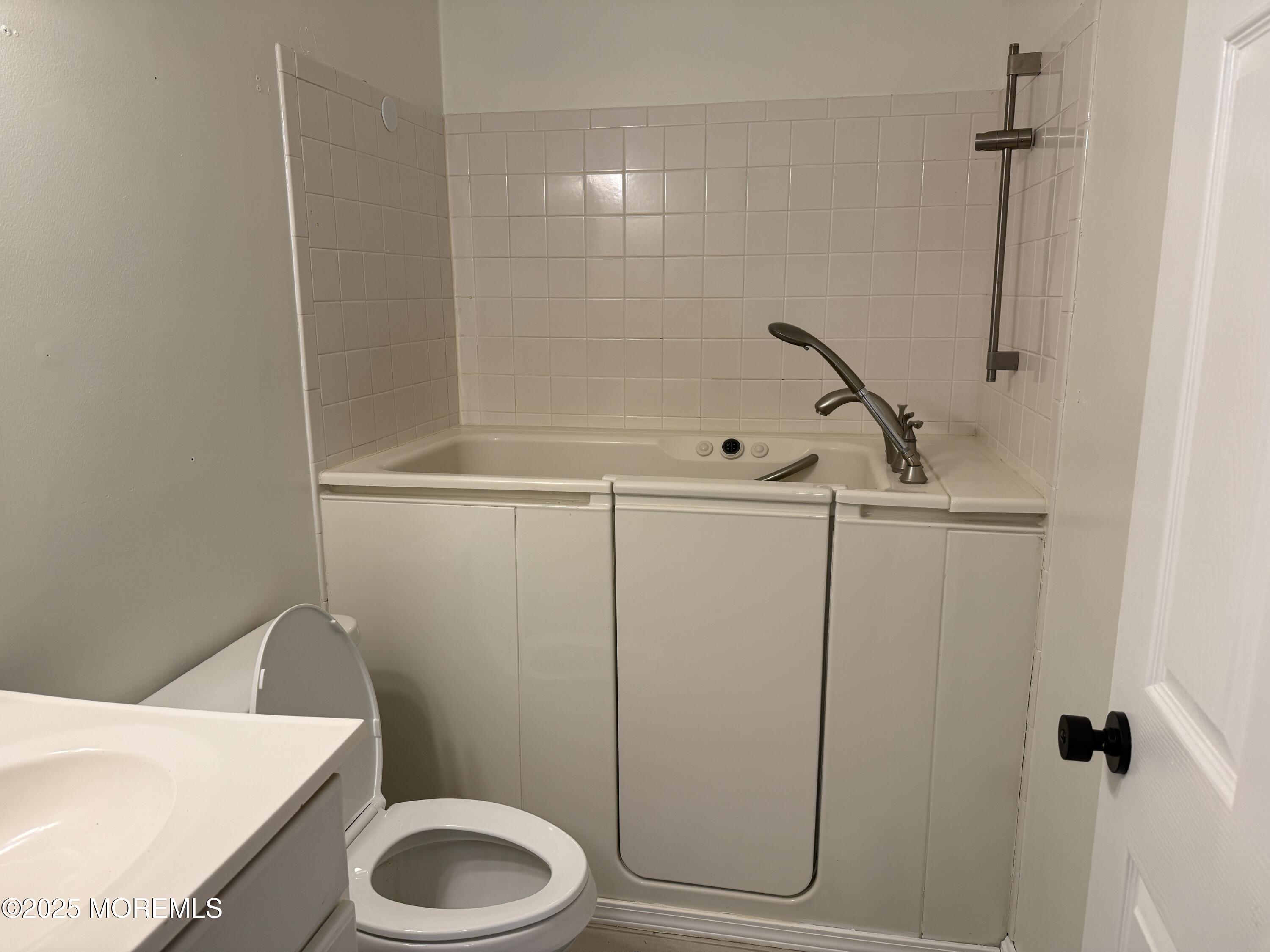 220 B Center Street Tuckerton, NJ 08087 - Photo 29 of 54 a bathroom with a sink a toilet and shower