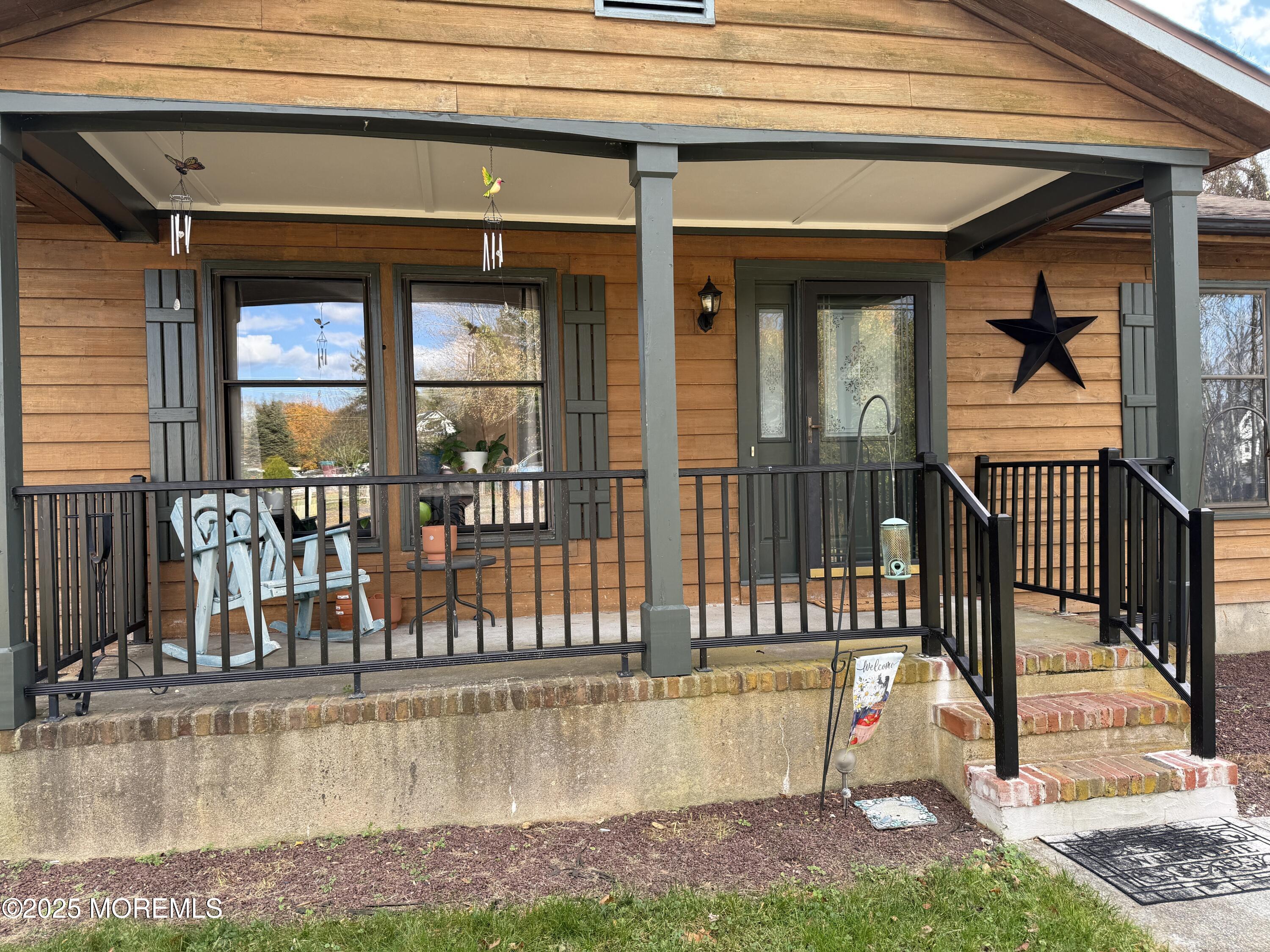 220 B Center Street Tuckerton, NJ 08087 - Photo 3 of 54 a view of a house with swimming pool and wooden fence
