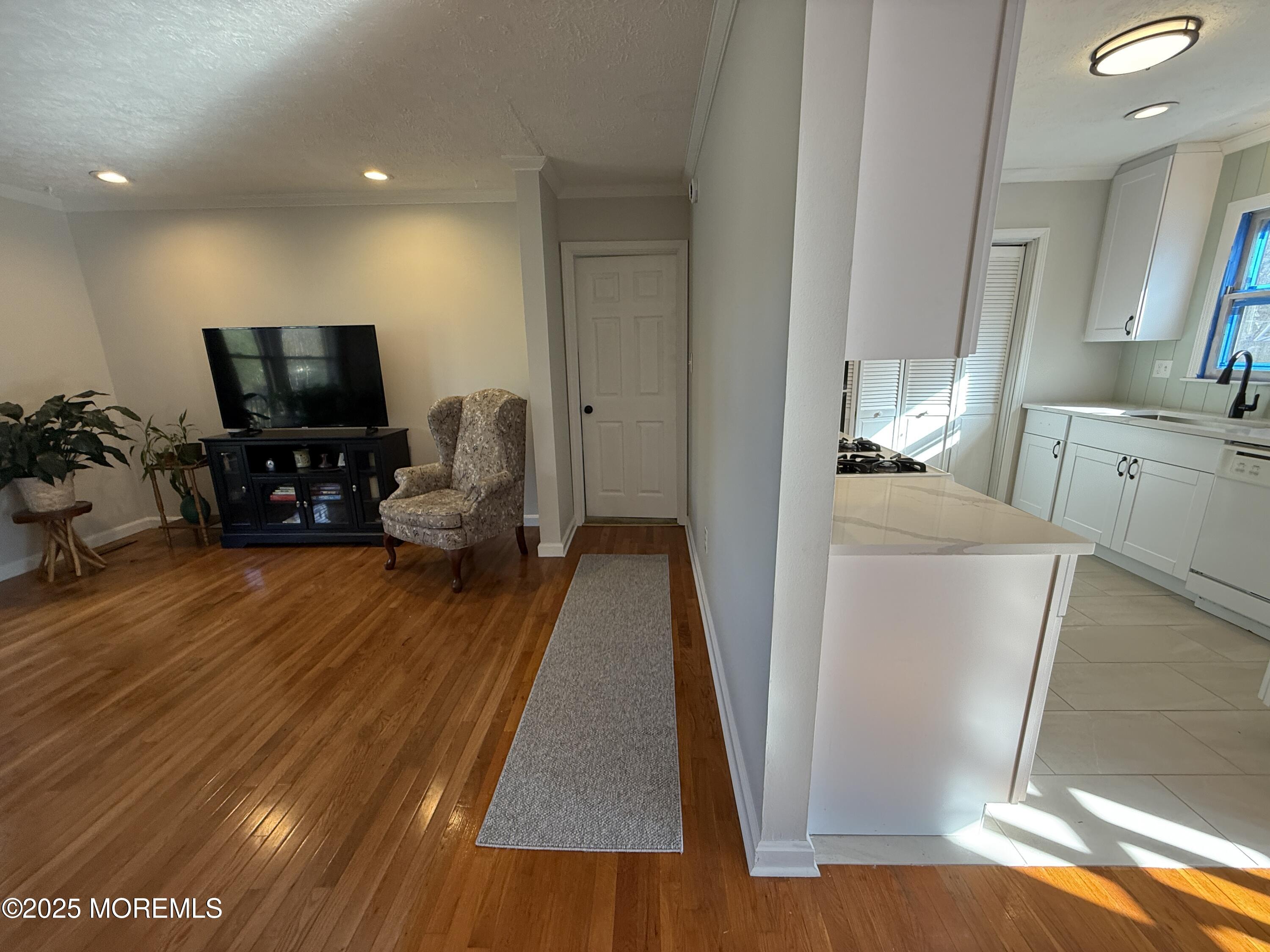 220 B Center Street Tuckerton, NJ 08087 - Photo 31 of 54 a living room with furniture and a flat screen tv