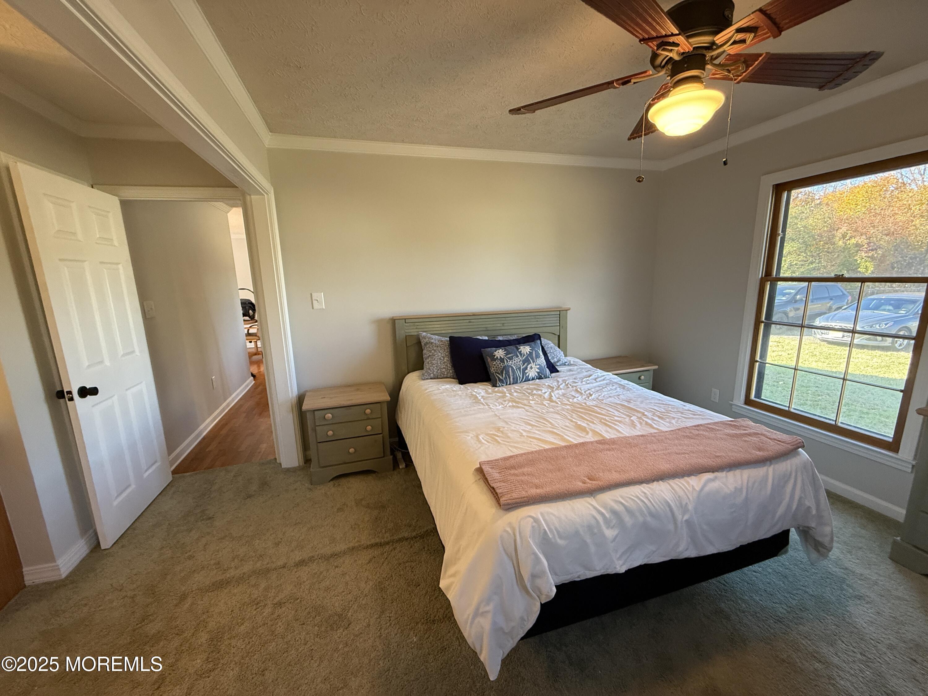 220 B Center Street Tuckerton, NJ 08087 - Photo 34 of 54 a bedroom with a bed and a window