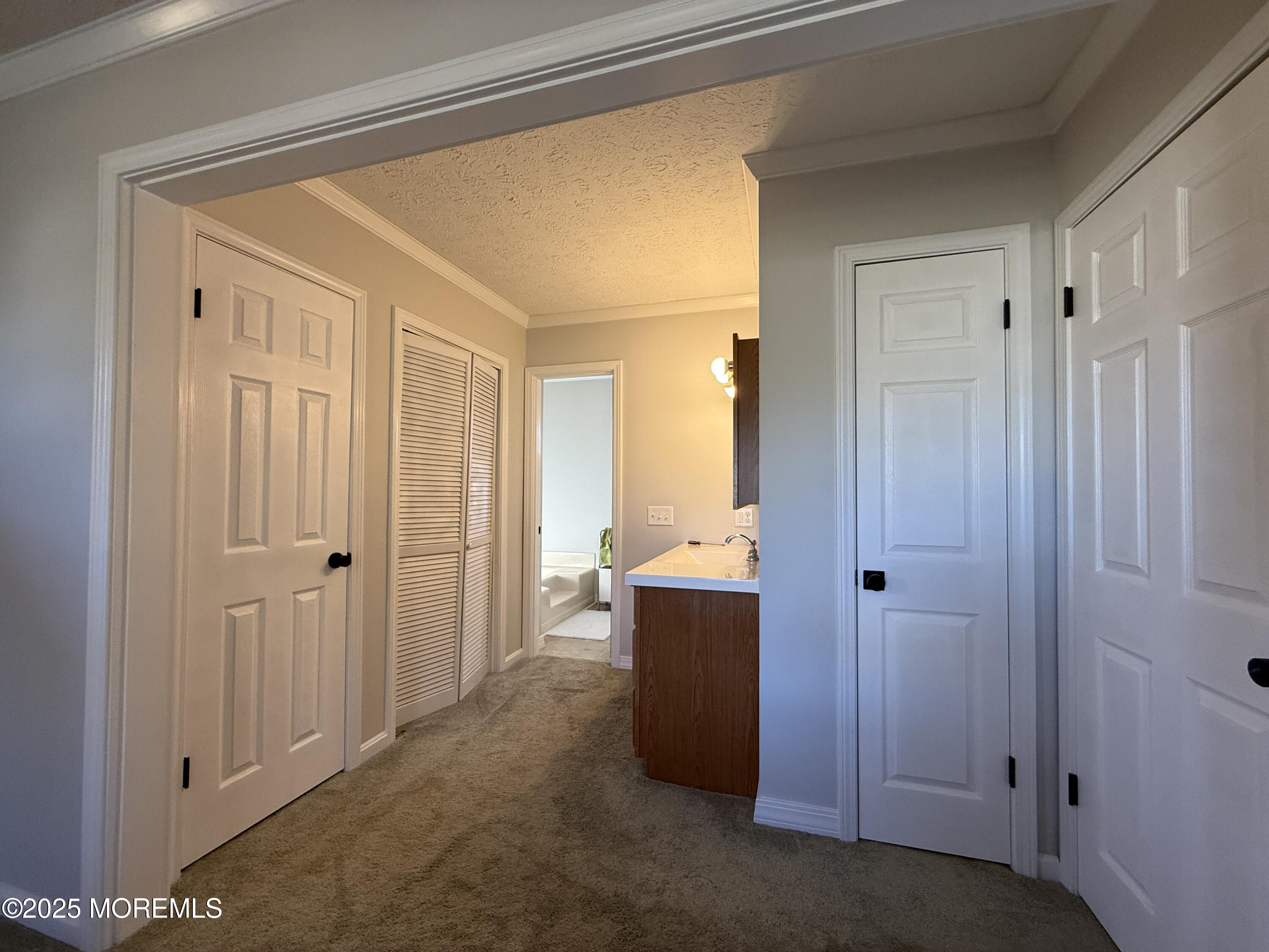 220 B Center Street Tuckerton, NJ 08087 - Photo 40 of 54 a view of a hallway with closet and bathroom