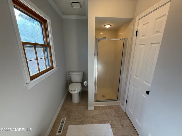 a bathroom with a tub and sink