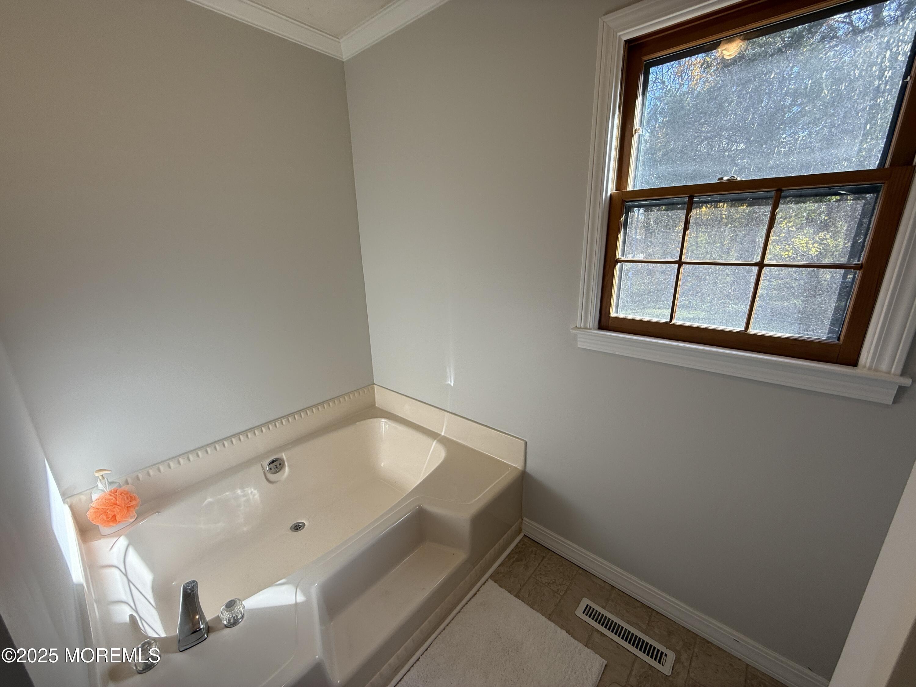 220 B Center Street Tuckerton, NJ 08087 - Photo 45 of 54 a bathroom with a tub and shower