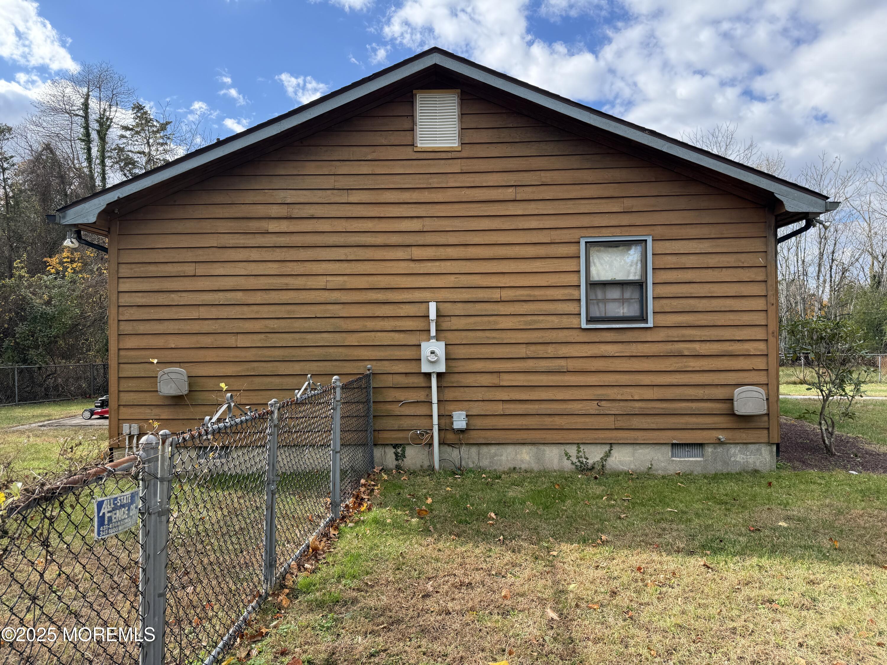 220 B Center Street Tuckerton, NJ 08087 - Photo 50 of 54 a front view of a house with garden