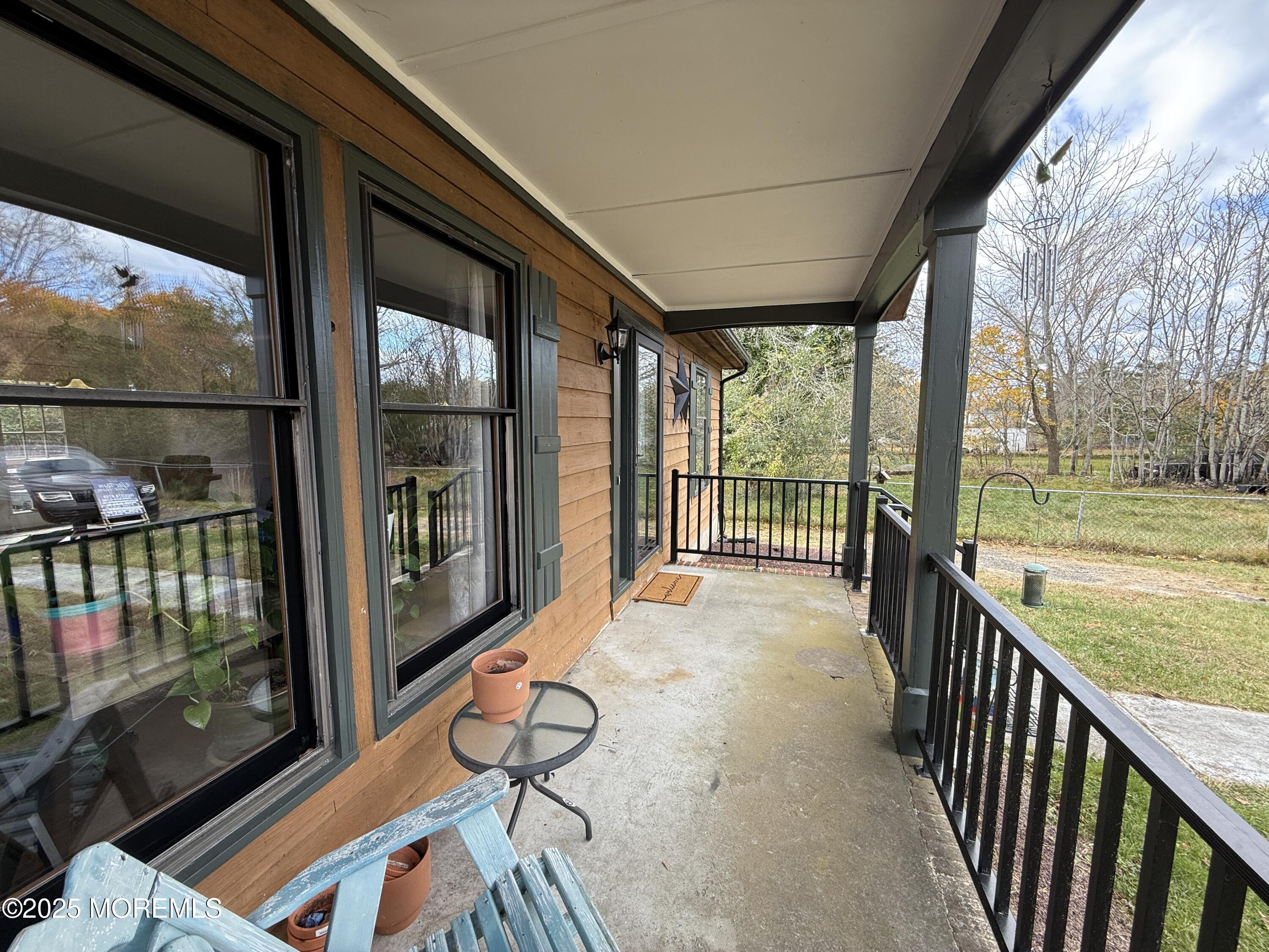 220 B Center Street Tuckerton, NJ 08087 - Photo 5 of 54 a view of a porch with wooden floor and outdoor space