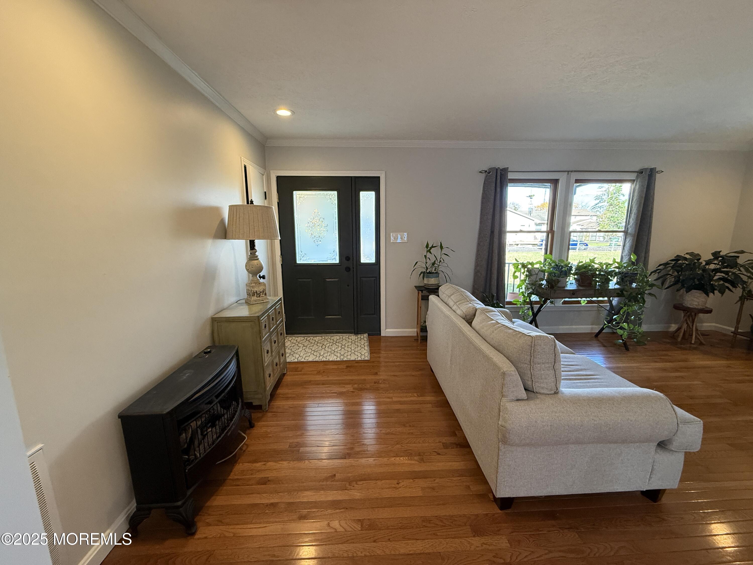 220 B Center Street Tuckerton, NJ 08087 - Photo 6 of 54 a living room with furniture and a fireplace