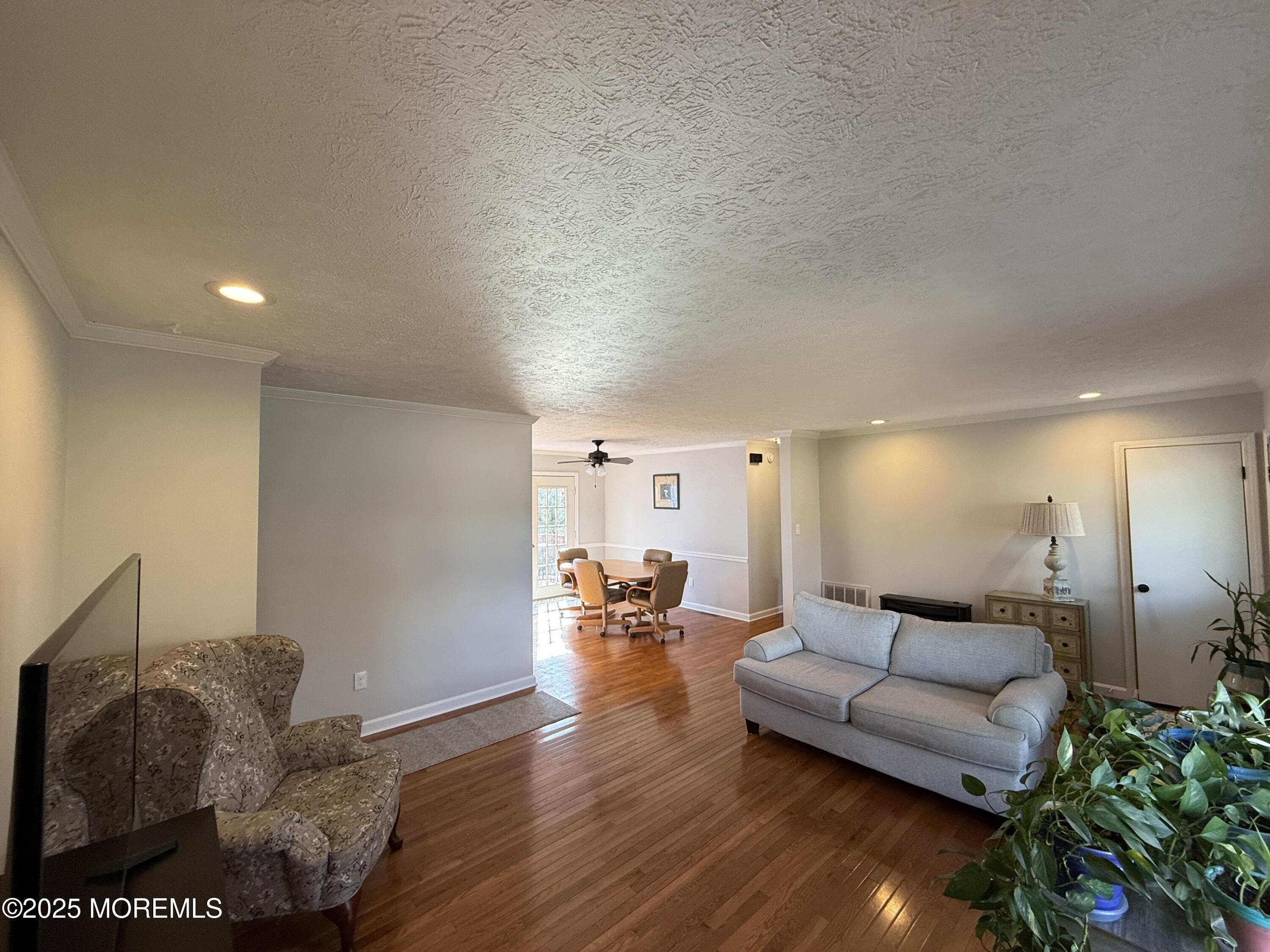 220 B Center Street Tuckerton, NJ 08087 - Photo 10 of 54 a living room with furniture and a wooden floor