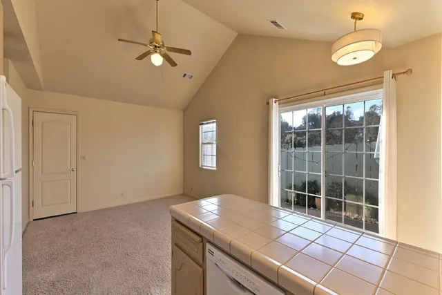 a room with a desk and a window