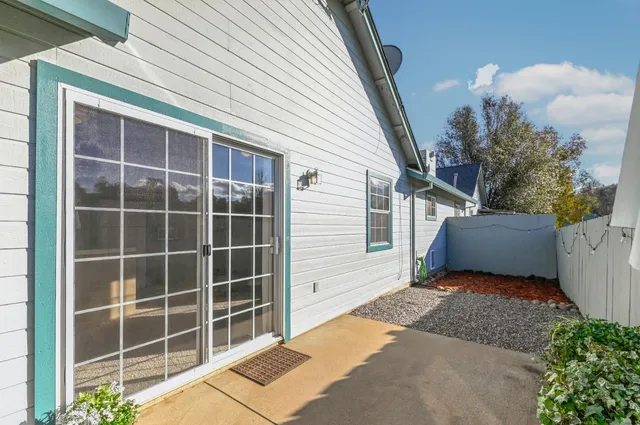 a view of a house with a large window