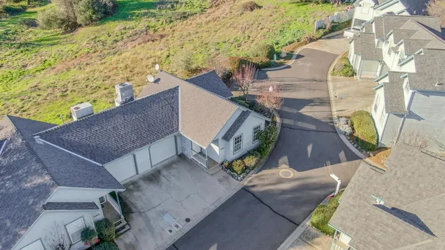 a view of residential houses with outdoor space