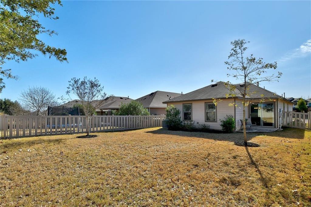 201 Edwin Kyle, TX 78640 - Photo 21 of 21 a front view of a house with a yard