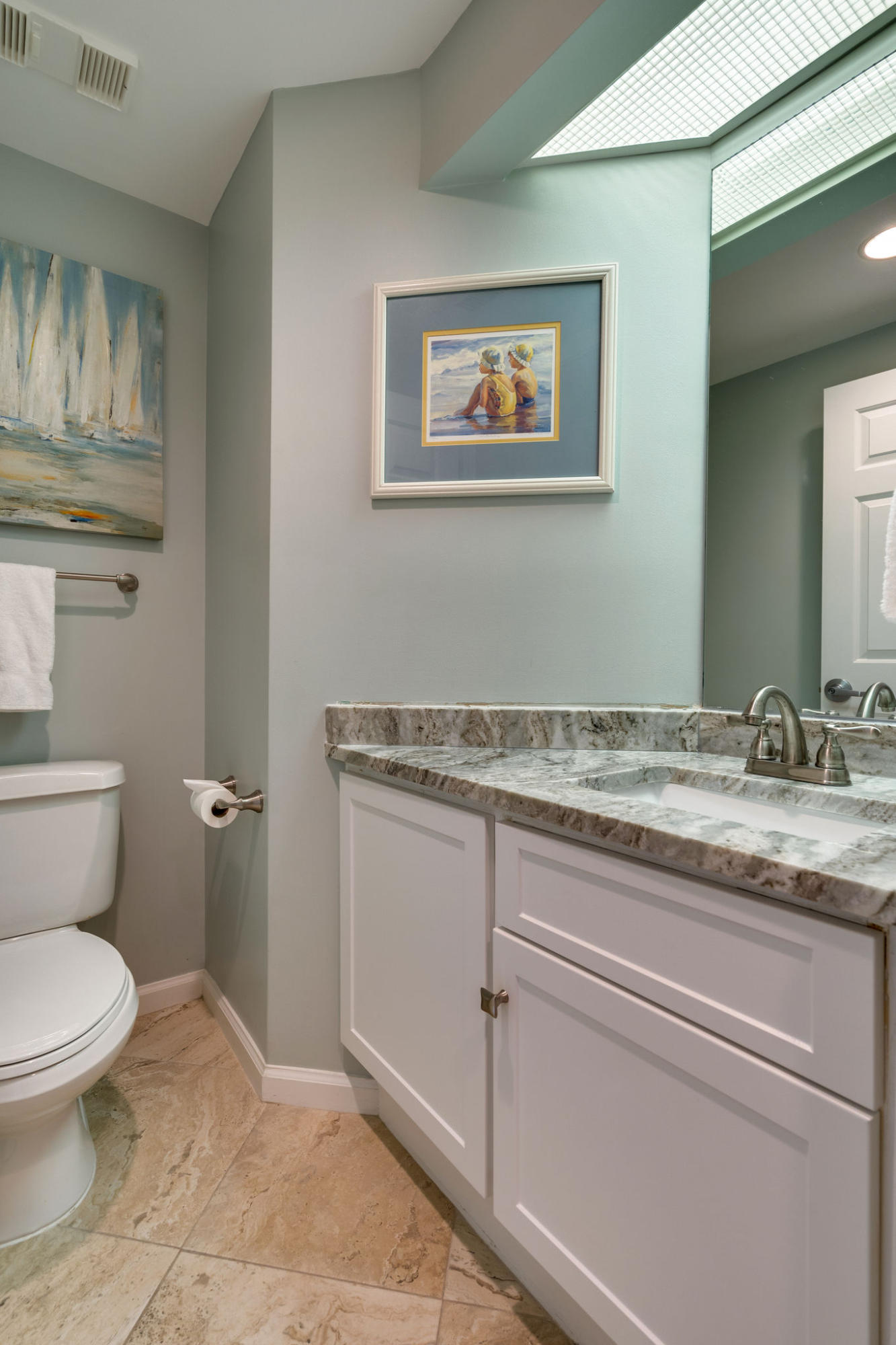 4807 Westwinds Drive, Unit 4807 Miramar Beach, FL 32550 - Photo 15 of 19 a bathroom with a granite countertop toilet sink and mirror