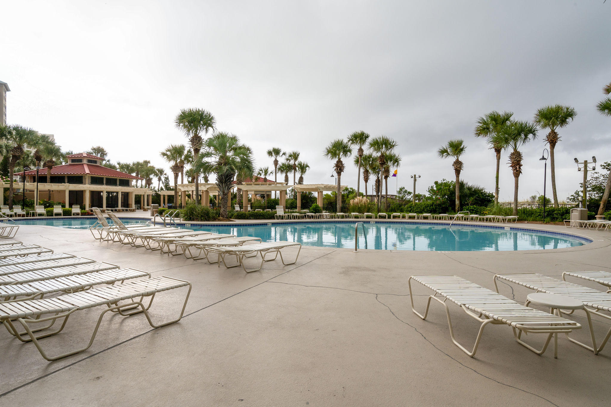 4807 Westwinds Drive, Unit 4807 Miramar Beach, FL 32550 - Photo 17 of 19 a view of patio with swimming pool