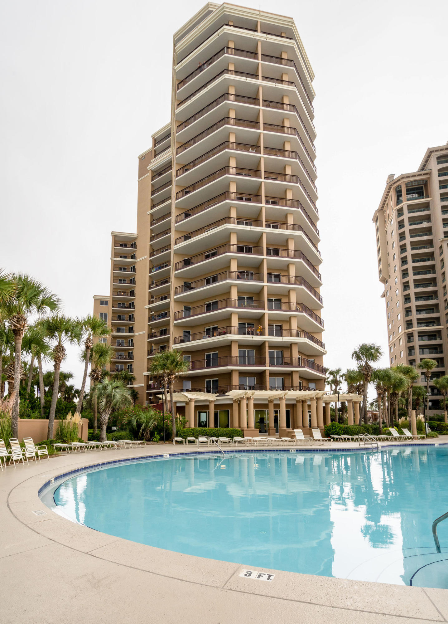 4807 Westwinds Drive, Unit 4807 Miramar Beach, FL 32550 - Photo 18 of 19 a view of a swimming pool with a lake