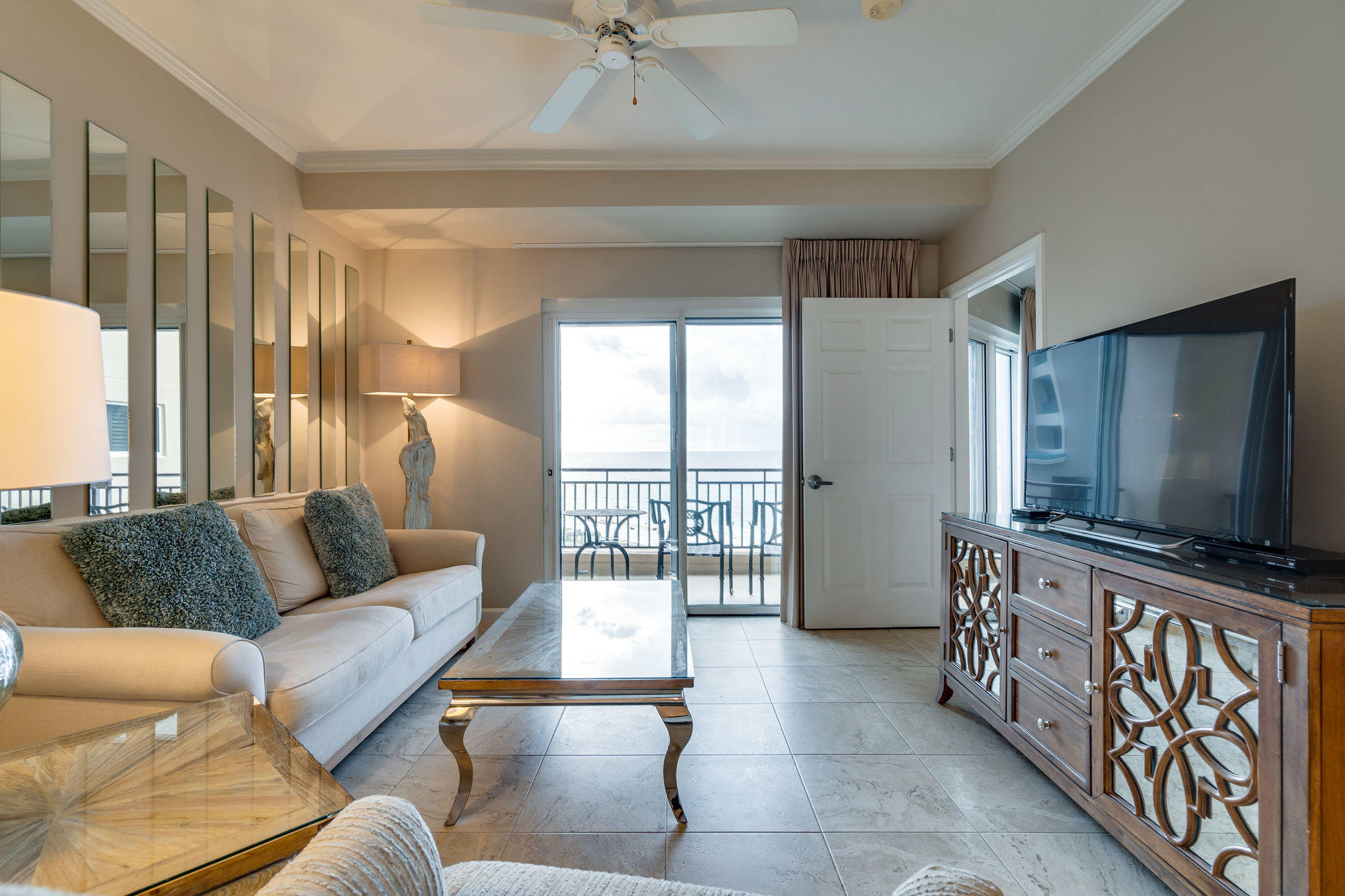 4807 Westwinds Drive, Unit 4807 Miramar Beach, FL 32550 - Photo 3 of 19 a living room with furniture and a flat screen tv