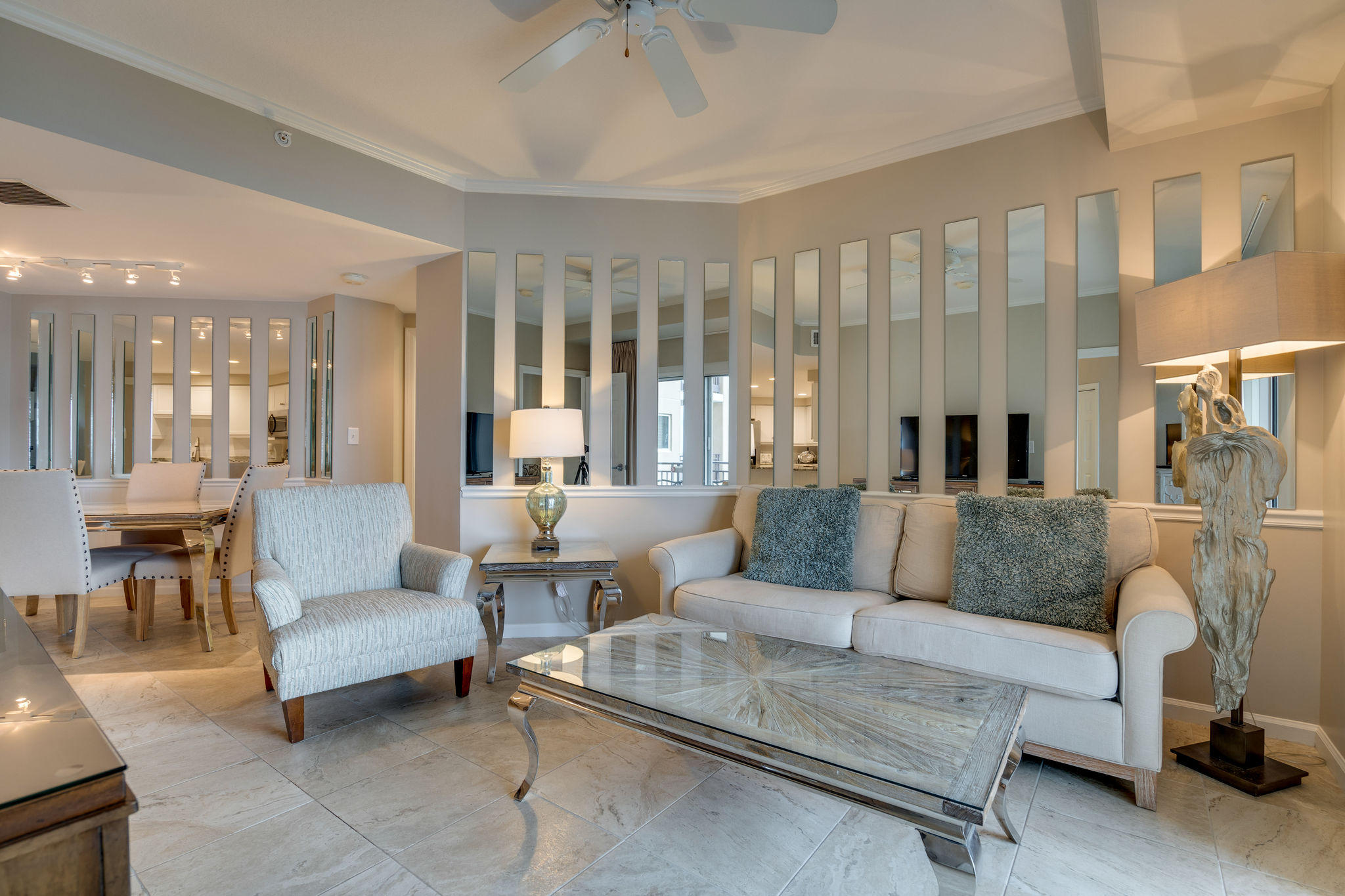 4807 Westwinds Drive, Unit 4807 Miramar Beach, FL 32550 - Photo 4 of 19 a living room with furniture and a large window