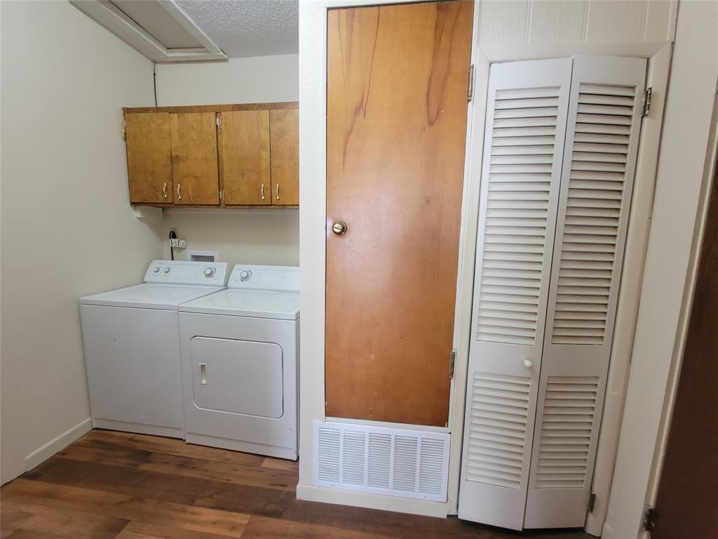 215 Cedar Court Graham, TX 76450 - Photo 23 of 39 a bathroom with a sink and a mirror