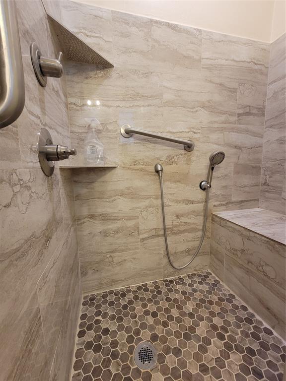 215 Cedar Court Graham, TX 76450 - Photo 28 of 39 a bathroom with a shower