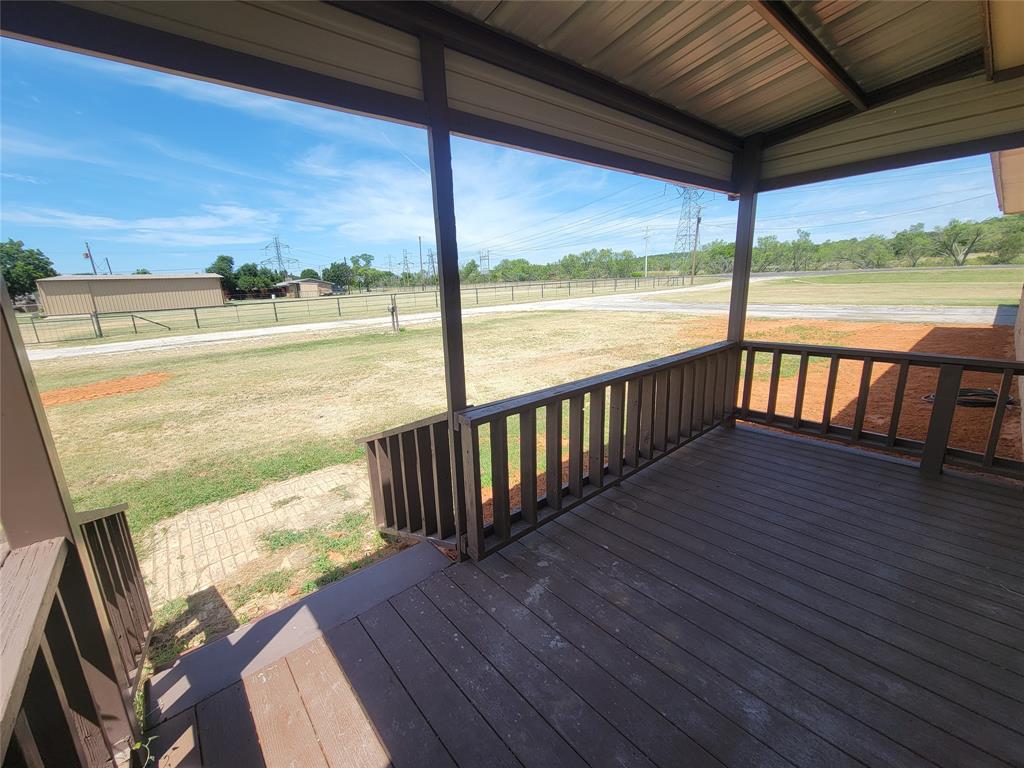 215 Cedar Court Graham, TX 76450 - Photo 31 of 39 a view of balcony with wooden floor