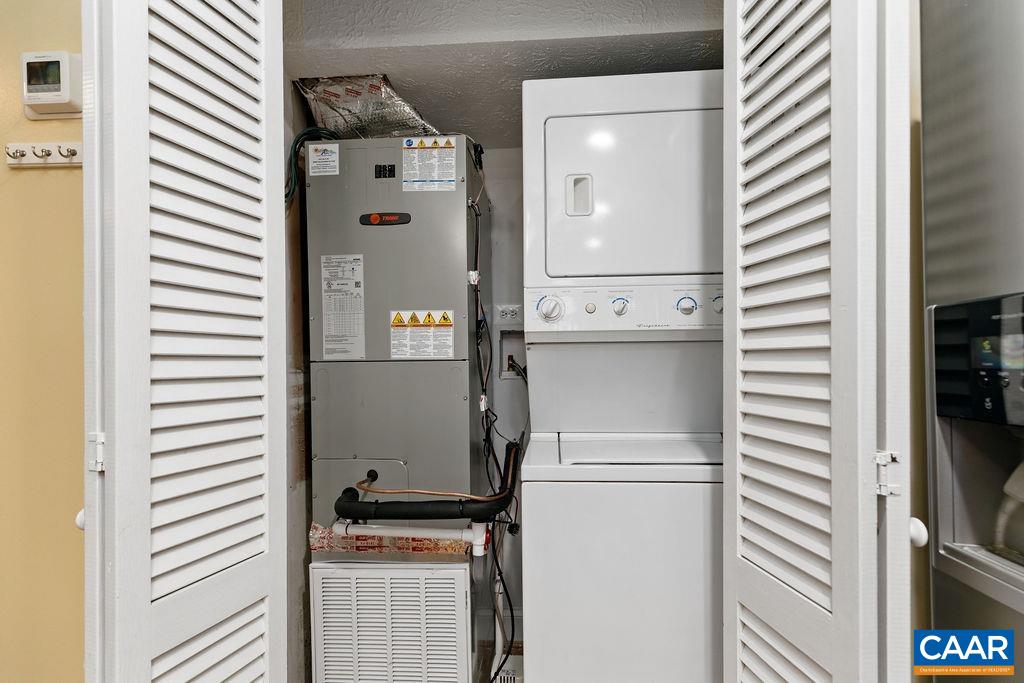 411 Three Ridges Roseland, VA 22967 - Photo 12 of 27 a close view of a utility room with washer and dryer