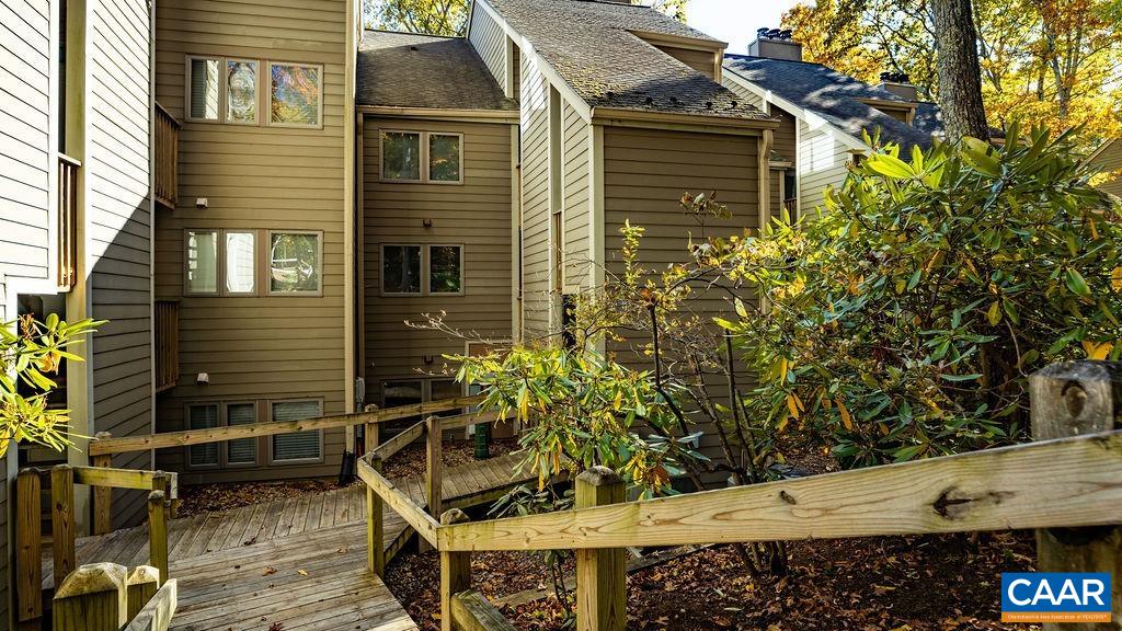 411 Three Ridges Roseland, VA 22967 - Photo 23 of 27 a view of house with wooden fence
